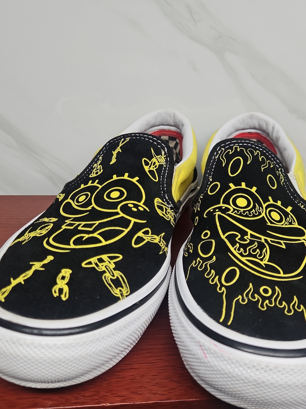 Black & Yellow Cartoon Slip-On Sneakers